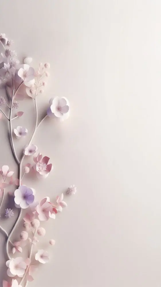 Soft 3D paper flowers in pink and lavender on right side of pale background